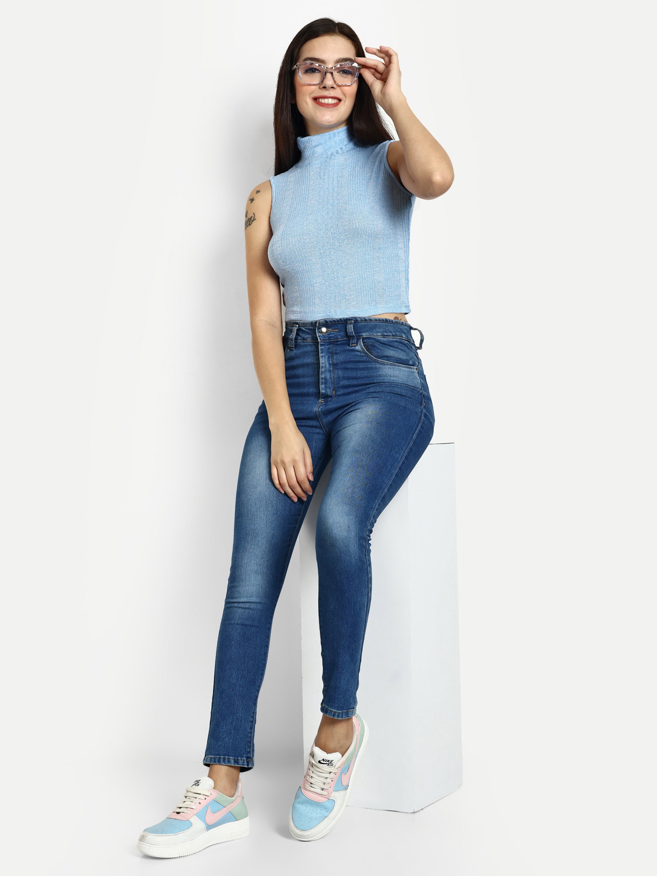 Women Solid Blue Ribbed Sleeveless Crop Top with a Turtle Neck