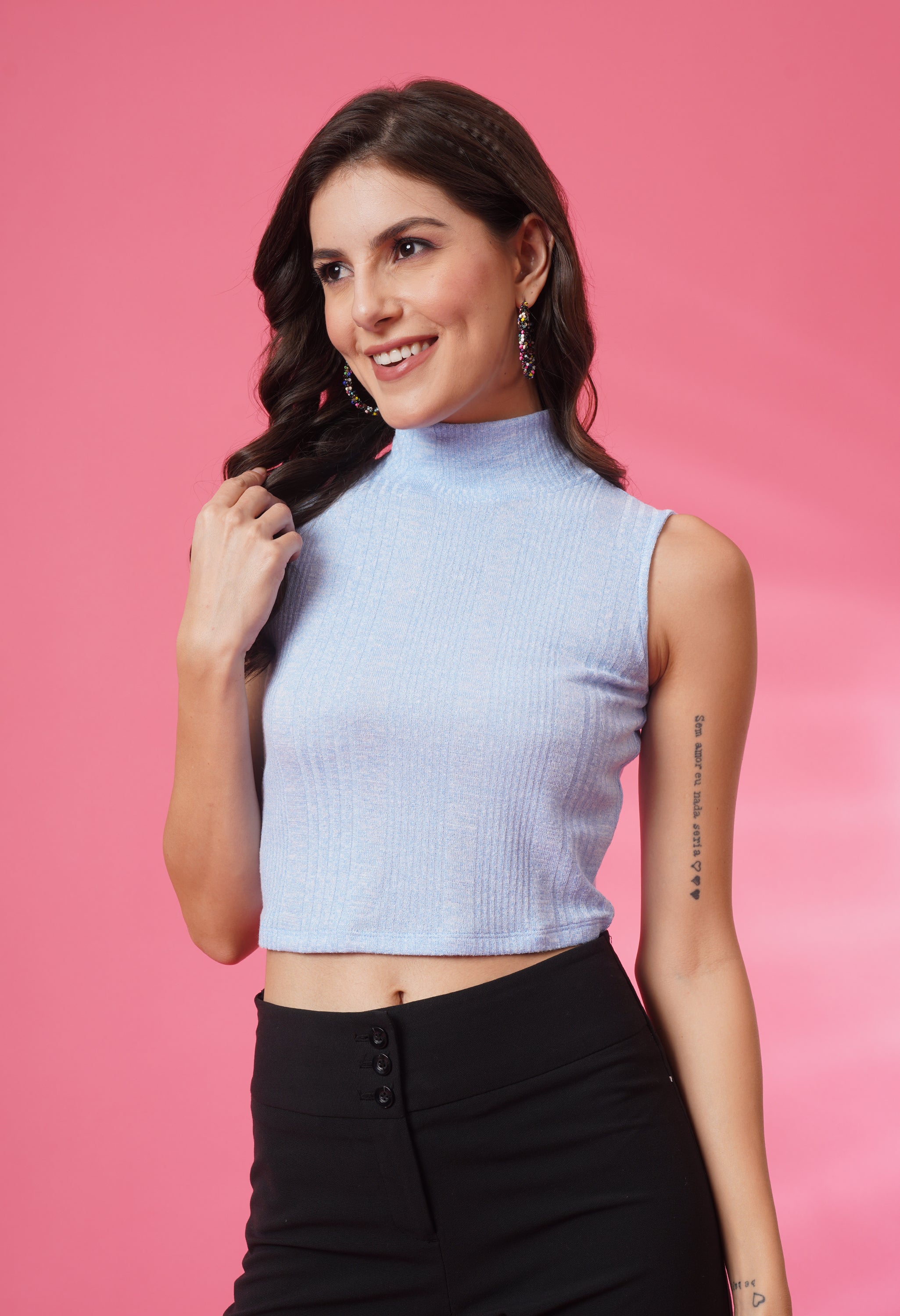 Women Solid Black Ribbed Sleeveless Crop Top with a Turtle Neck