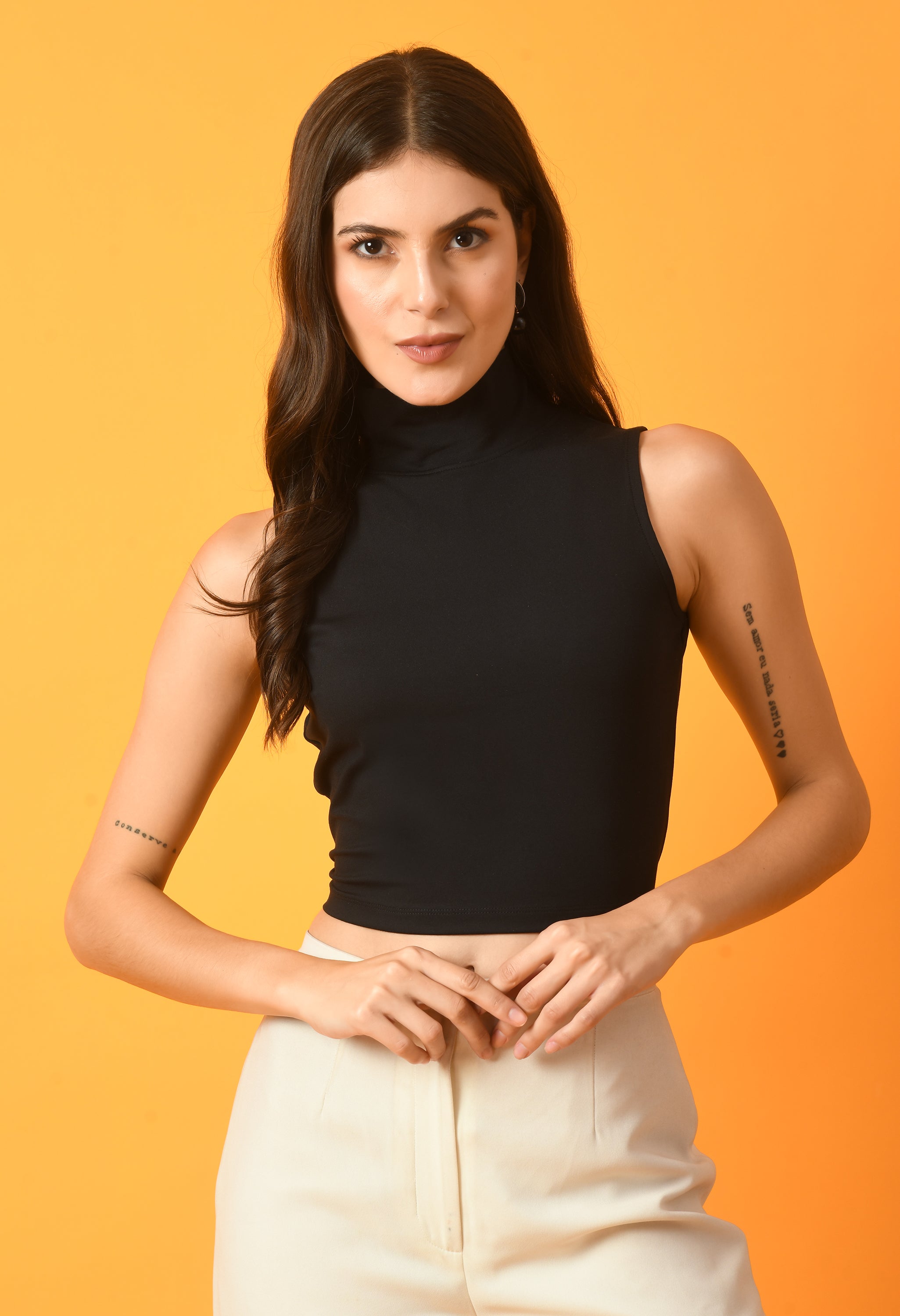 Women Solid White Ribbed Sleeveless Crop Top with a Turtle Neck